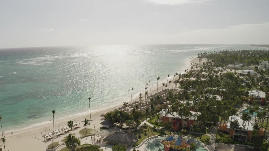 Aerial landscape of turquoise seaside hotels and resorts