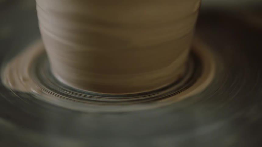 Clay vase being made on a machine