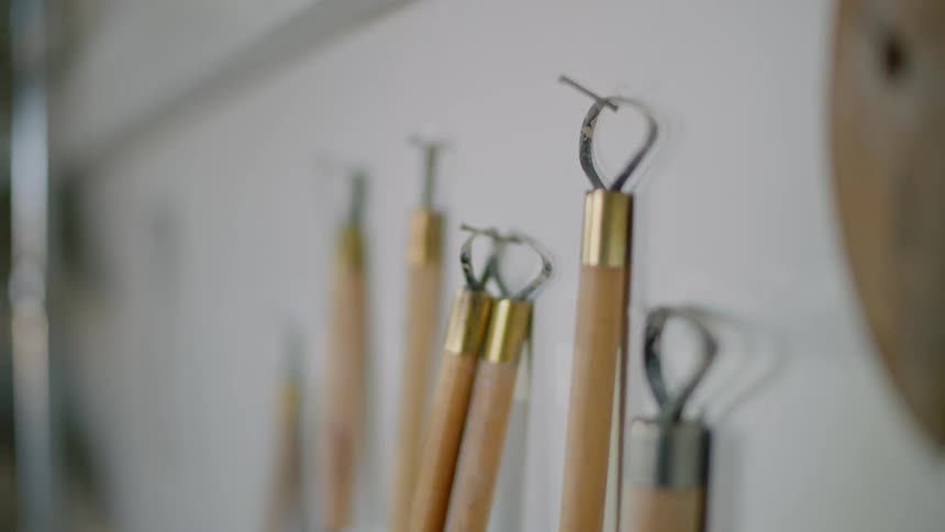 Tools hanging on the white wall