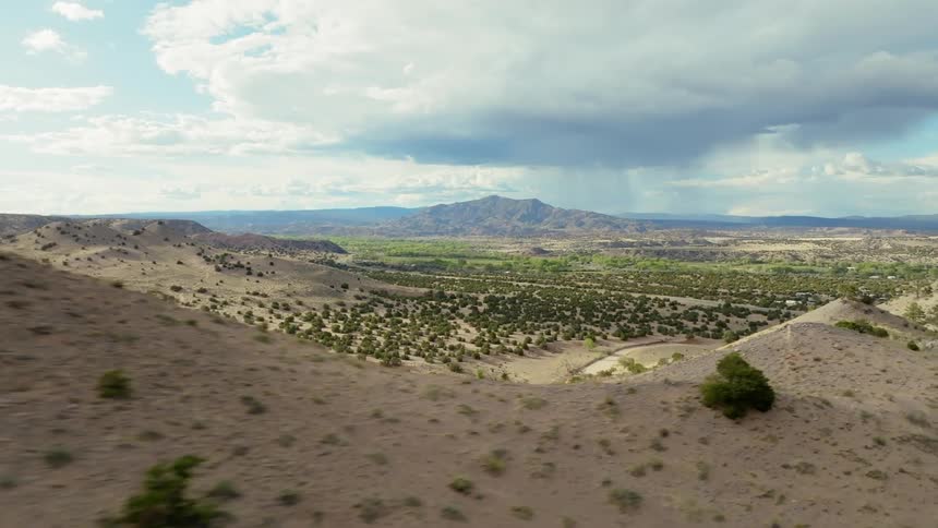 A large flat area near a mountain