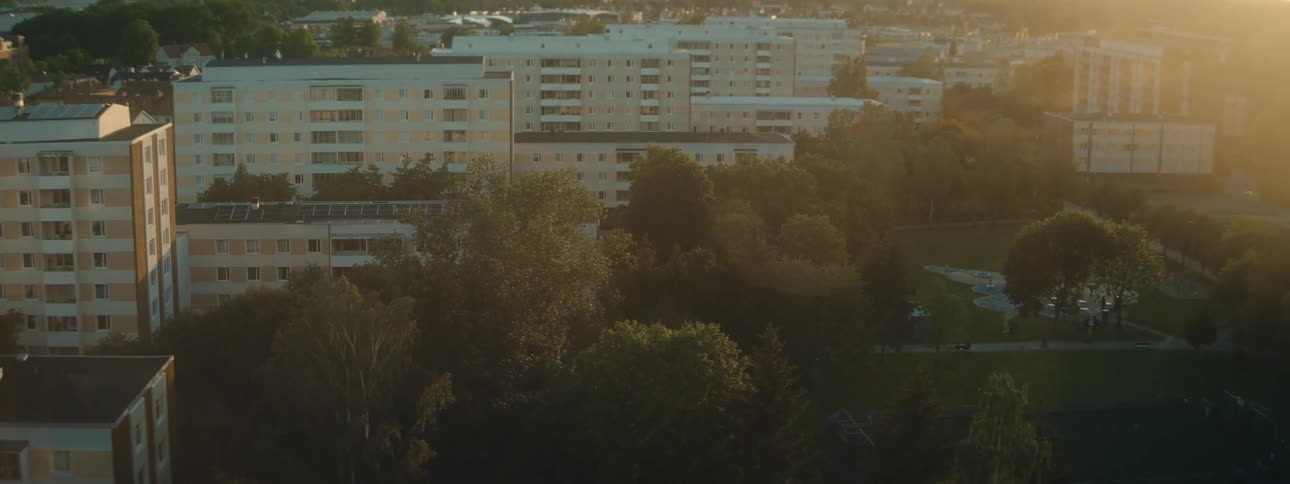 View from above with residential buildings in a late afternoon
