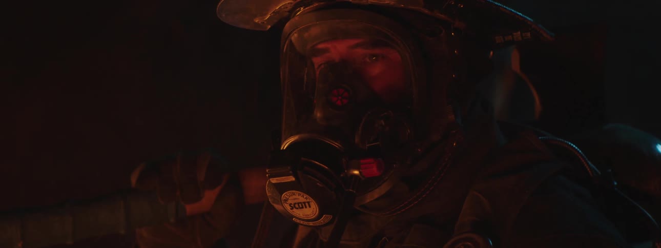 Portrait of a man with a protective mask in a night environment