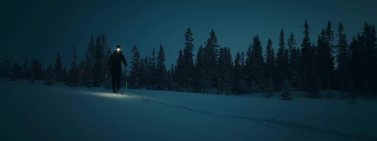 A clip of a person snowboarding in the night