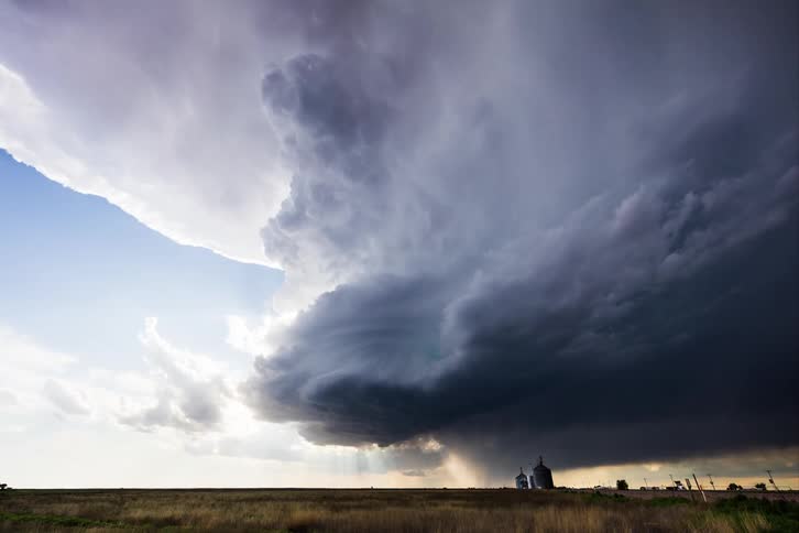 Dark storm clouds gather in the sky