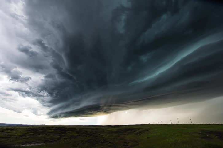 Time lapse of dark storm clouds rolling over the plainstion