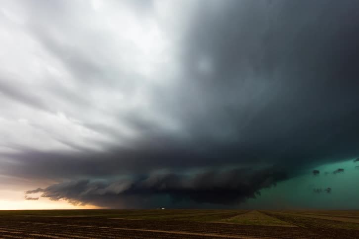 Storm clouds in rotation as a supercell storm moves across the ground