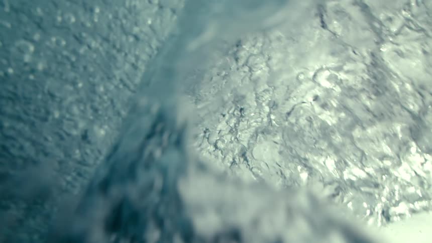 A large ocean wave passing overhead