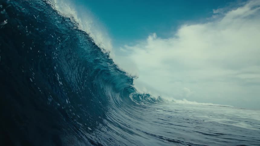 A furious wave at sunset