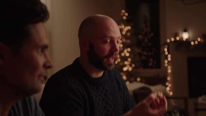 Men talking during a fun dinner