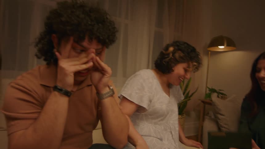A family together looking at a photo album
