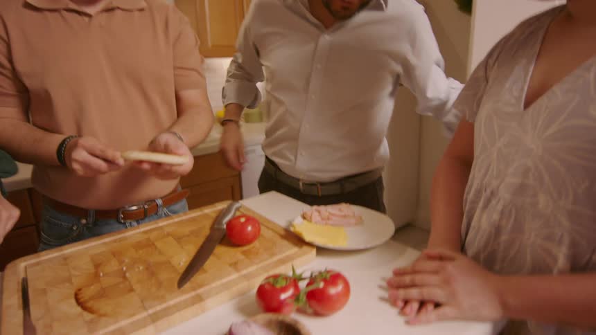 A family having fun preparing a meal