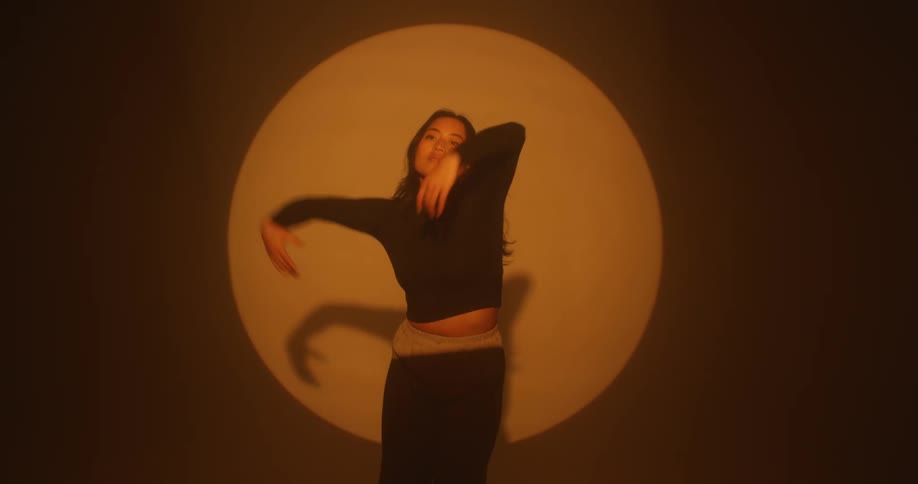Woman dancing indoors