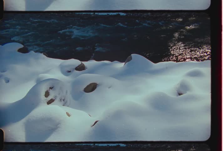 Corrente river with snow around