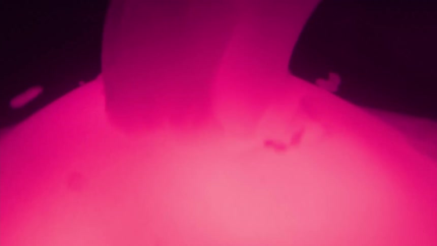 Abstract hard and solid neon pink coloring with falling splinters