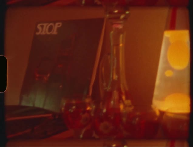 Decorative voices in lampshade on a bookshelf