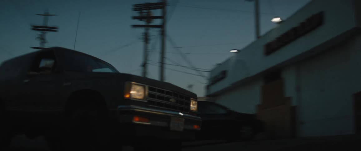 Pickup truck entering an establishment