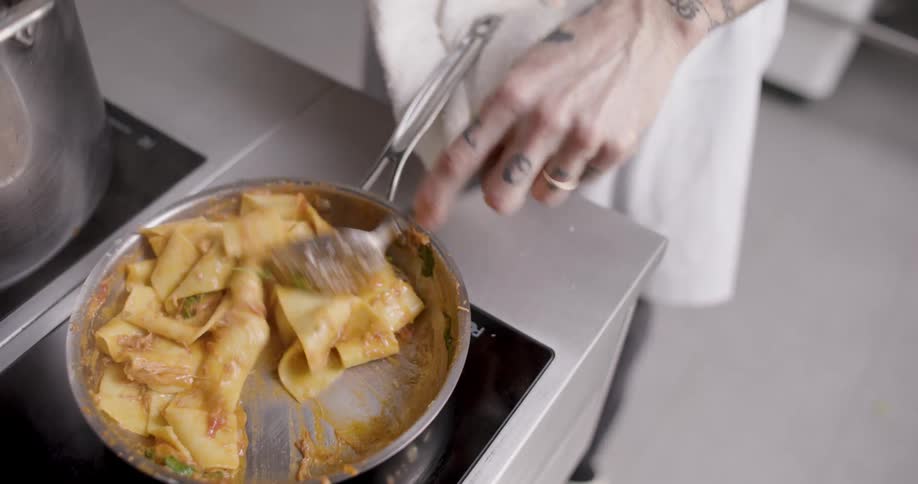 Close in a small pan being prepared pasta