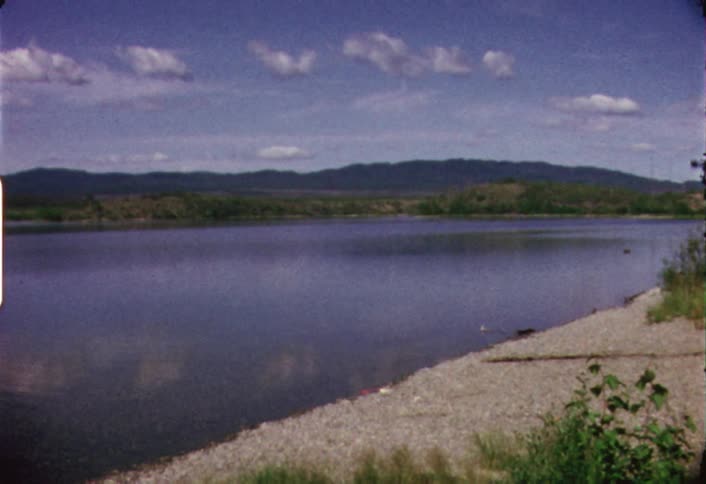 Calm lake as seen from the shoreline