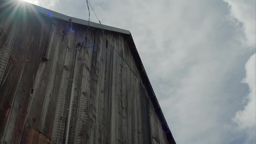 Cables stick out of the side of a building