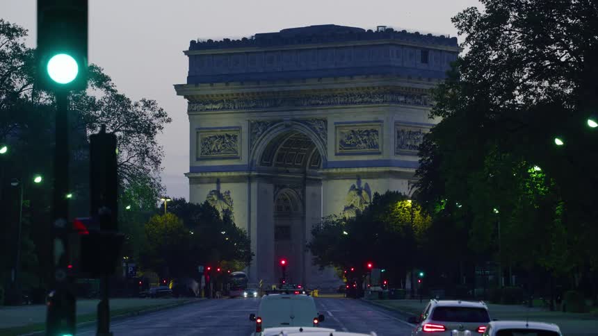 A road in paris leading to the arc de triomphe