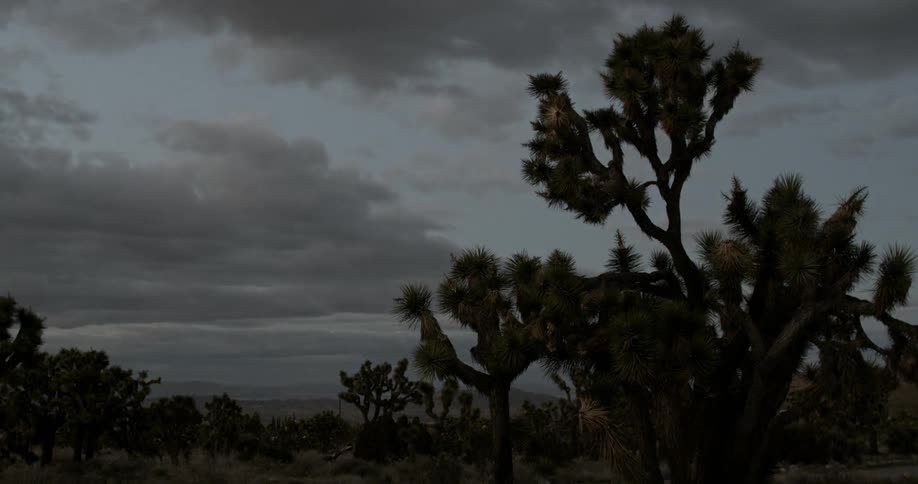 Time-lapse view of clouds passing over a desolate area