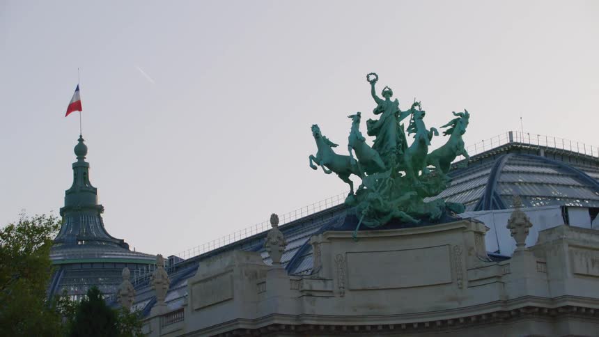 A large statue near a building