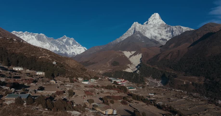 Aerial of a village with mount everest in the background