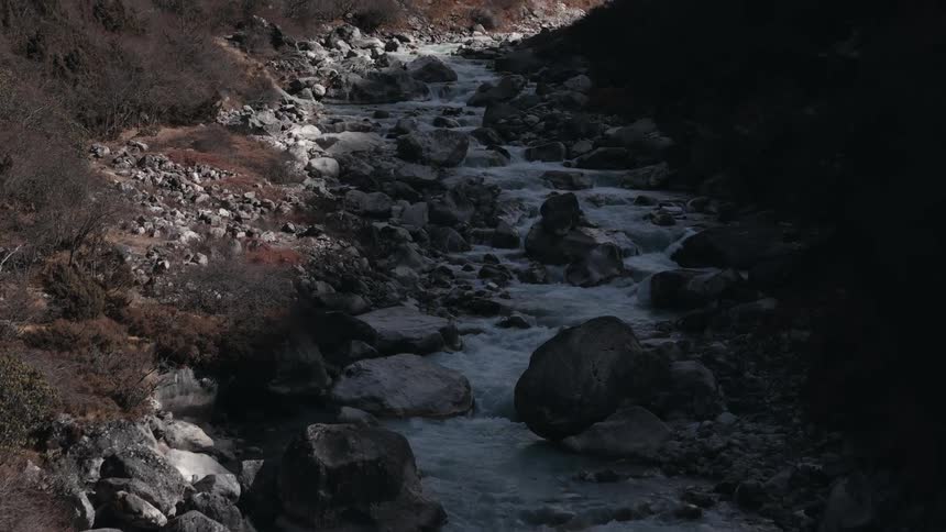 Aerial of a stream in the rocky mountains