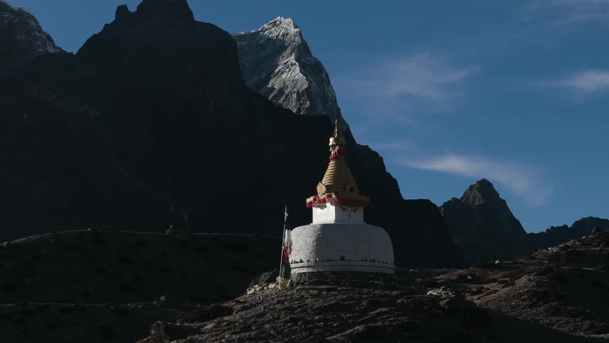 Temple on a hill in the middle of the mountains