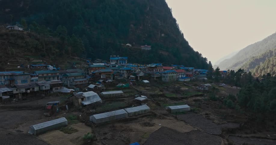 Houses on a hill in a mountain area at midday