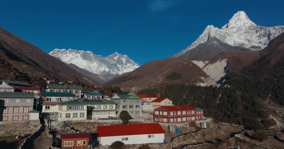 An aerial view of a rural community in the mountains
