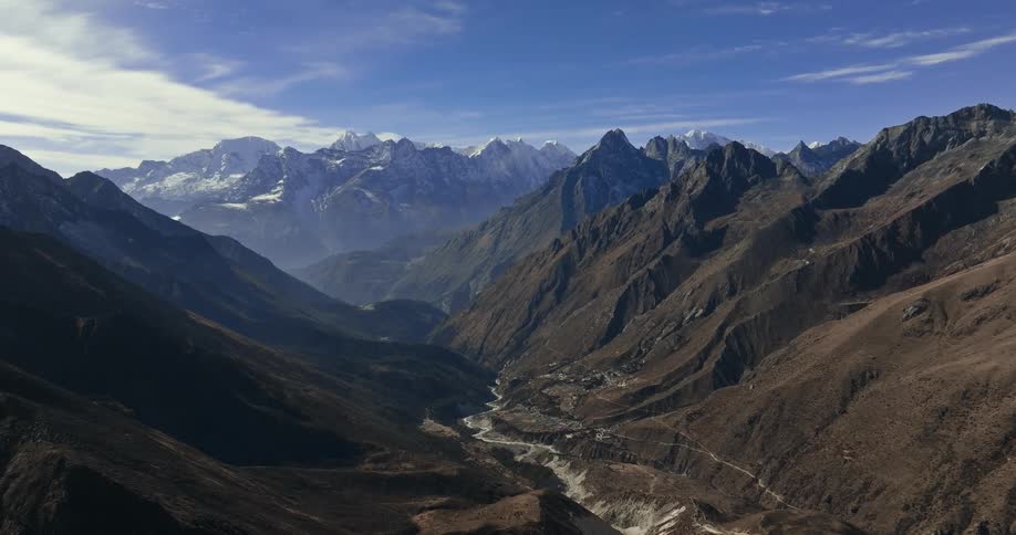 Aerial of a valley during a sunny winter day