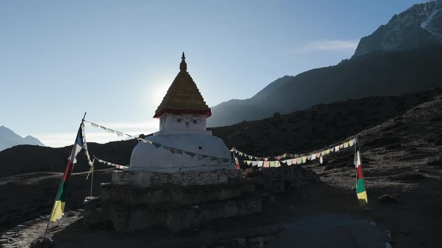 Sanctuary in the middle of a mountain in winter with blue sky and solar reflection