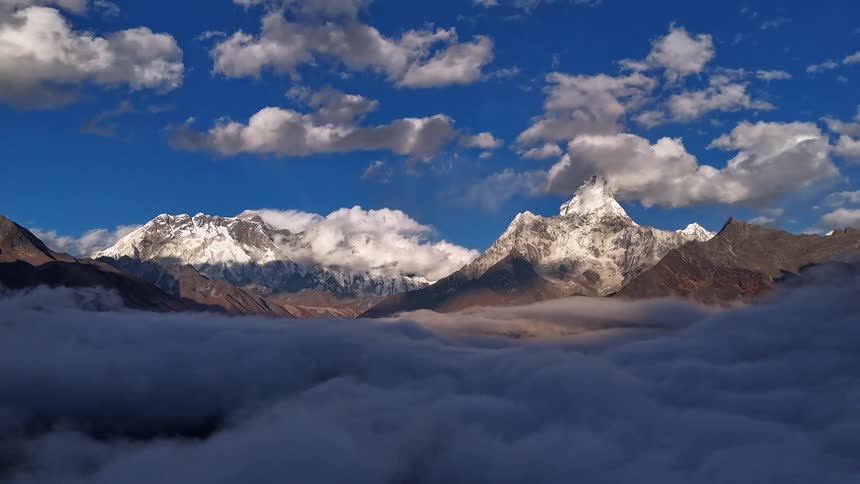 Clouds float around mount everest