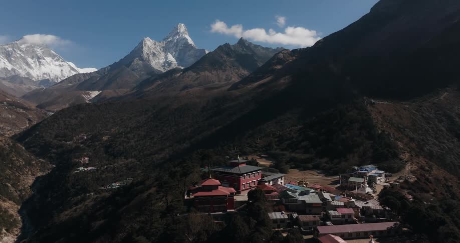 Aerial of buildings on a mountain at midday