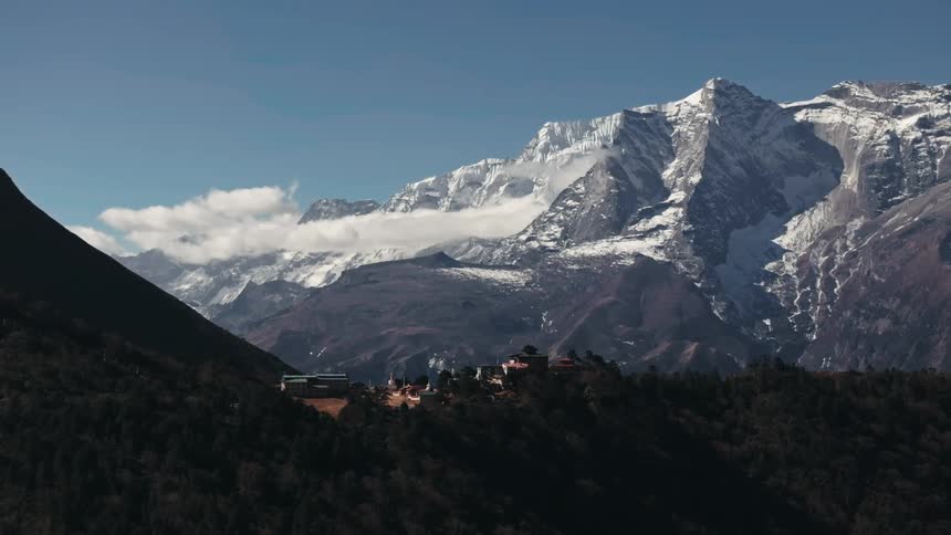 Landscape of buildings in a mountain area at midday