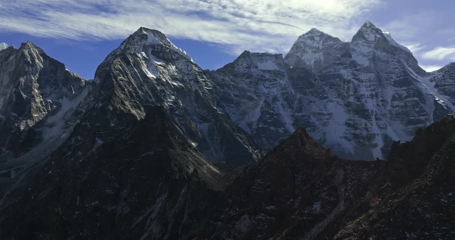 A mountain range with snowy peaks
