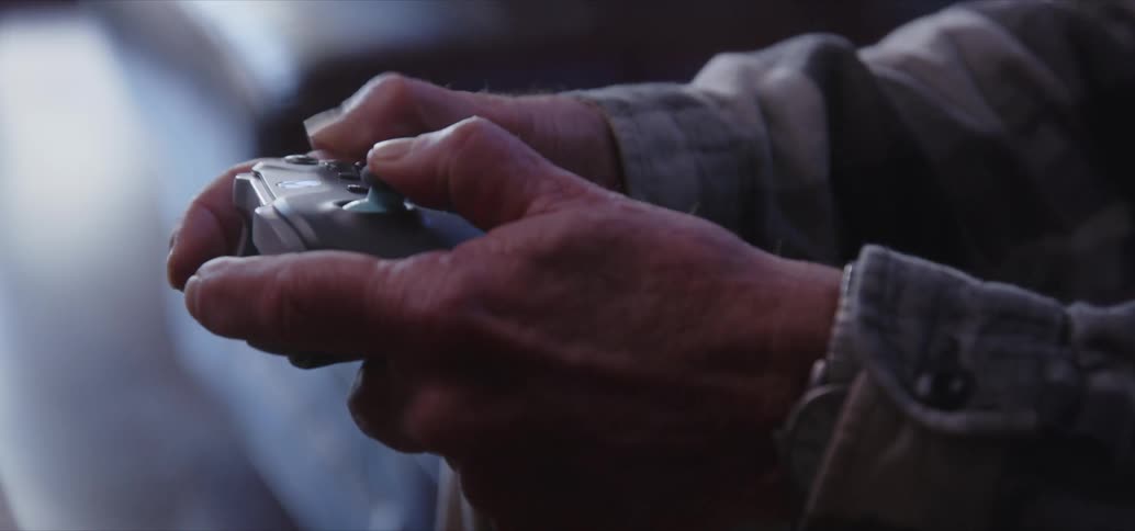 A person playing video games with a controller