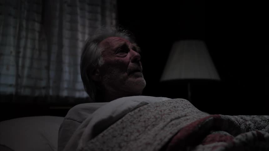 A clip of an old man waking in shock