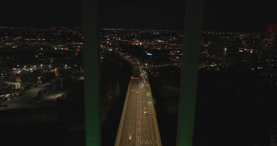 Skyline of a suspension bridge in the city at night