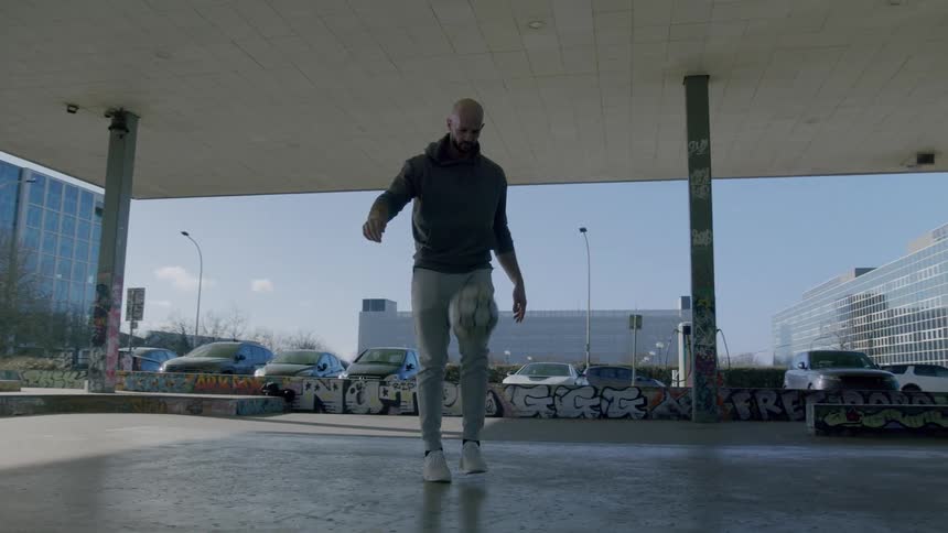 Man doing kicks with a soccer ball