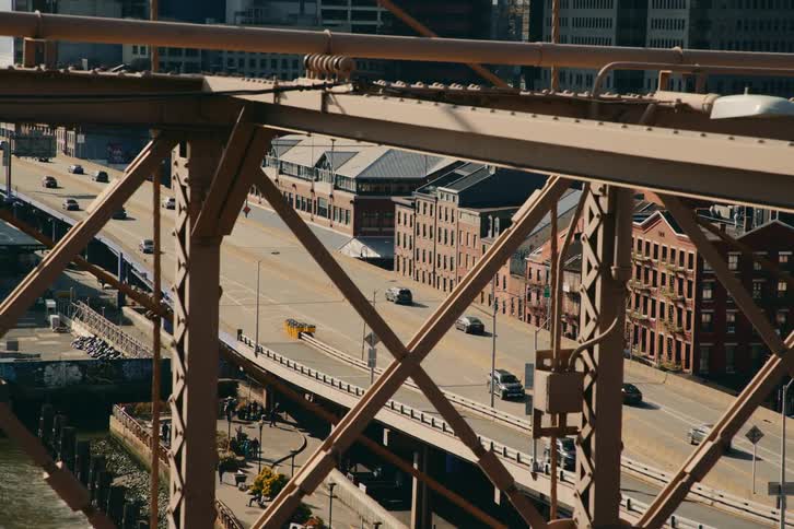 Traffic moves along an overpass in a city