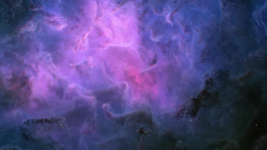 A colorful nebula filled with bright purple and blue hues in space