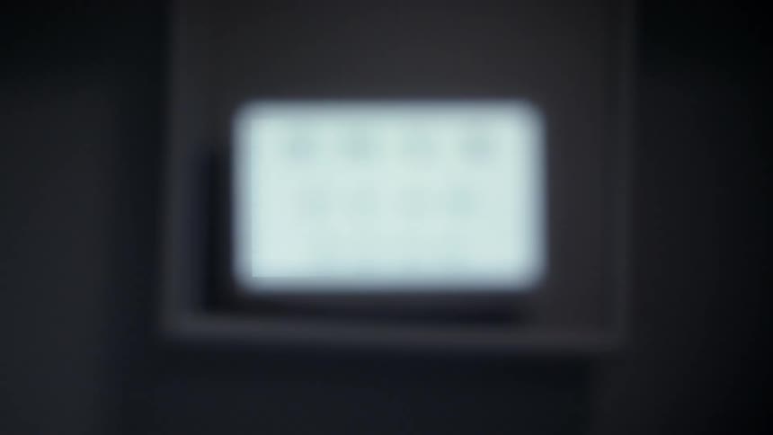 A screen displaying letters and going blur