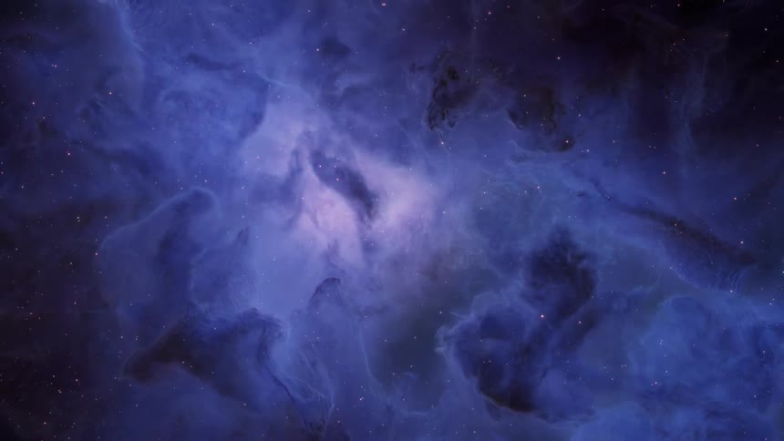 Blue colored nebula with a bright center rotates against stars in outer space