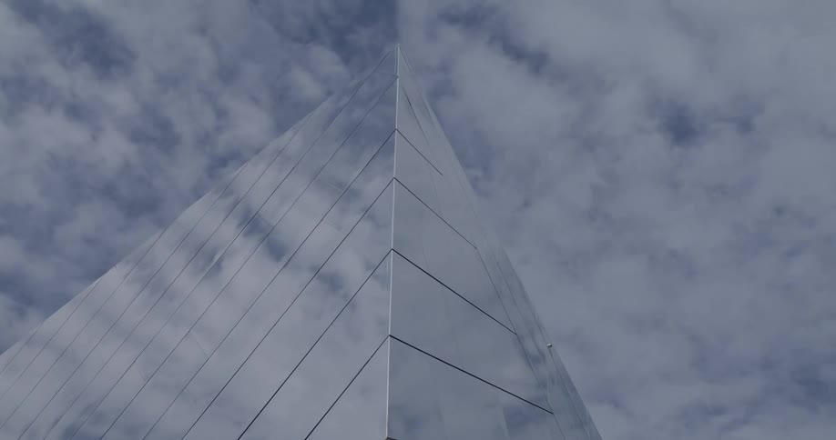 Top of a glass pyramid in the city