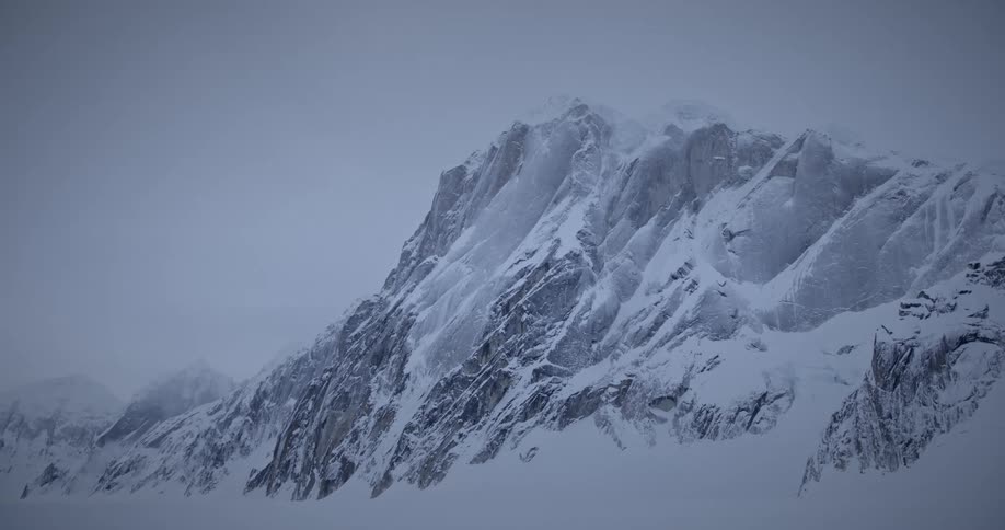 A snow covered mountain top