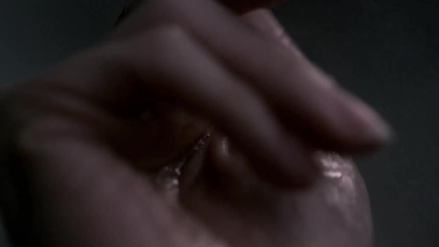 Wet palm being slowly closed