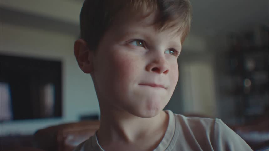 Portrait of a young little boy indoors