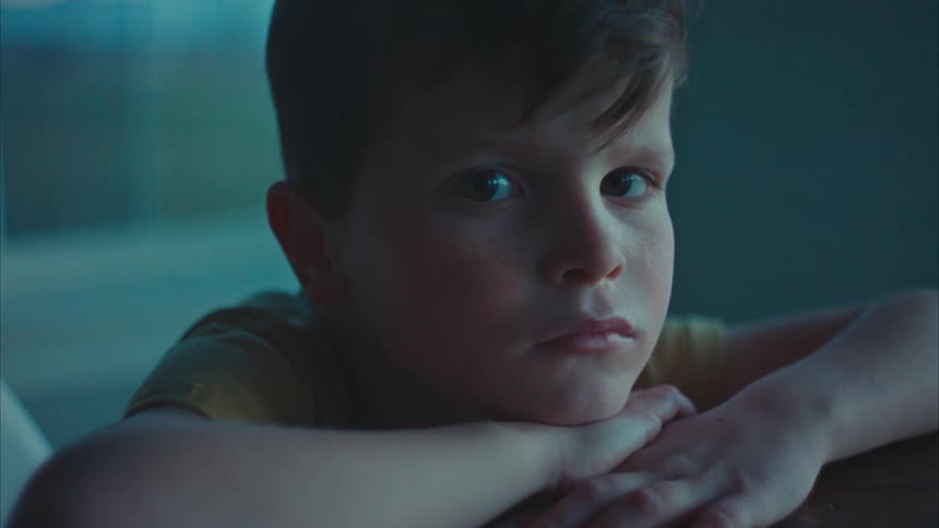 A clip of a boy in deep thought